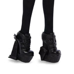 Monster High Wednesday Addams doll by Mattel featuring gothic style, black dress, and signature braided hair.