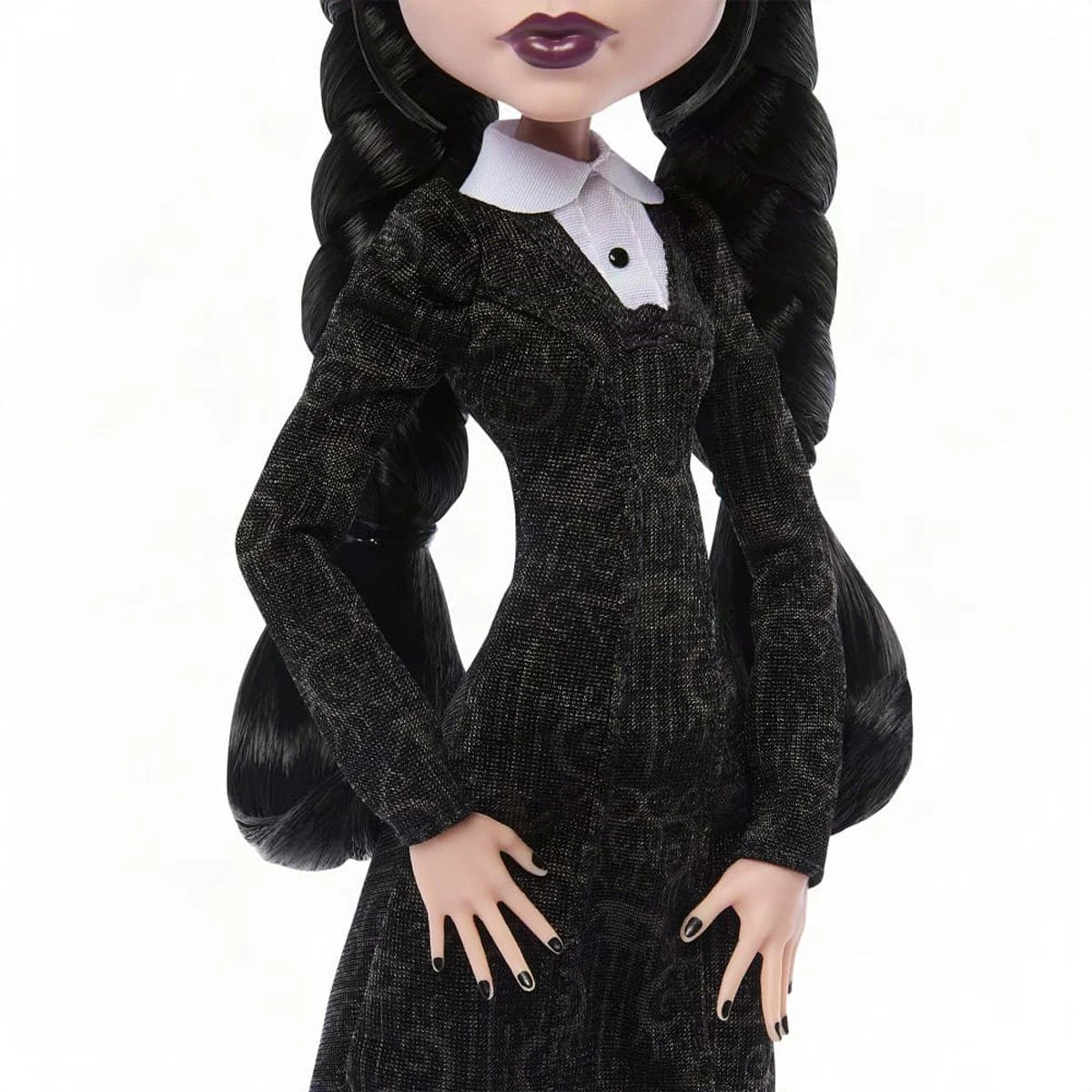 Monster High Wednesday Addams doll by Mattel featuring gothic clothing and characteristic dark hairstyle.