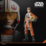 Star Wars Black Series Luke Skywalker X-Wing Pilot 6-inch action figure posed with helmet and detailed costume.