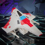 Transformers Shattered Glass Collection Voyager Starscream action figure by Hasbro, detailed robot with wings and vivid colors.