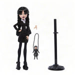 Mattel Monster High Wednesday Addams doll from the Wednesday series, featuring her signature gothic outfit and dark hairstyle.