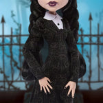 Mattel Monster High Wednesday Addams doll from the Wednesday series, featuring her signature gothic style and detailed outfit.