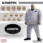 Kingpin One:12 Collective action figure by Mezco Toyz featuring detailed sculpt and costume, posed with accessories.